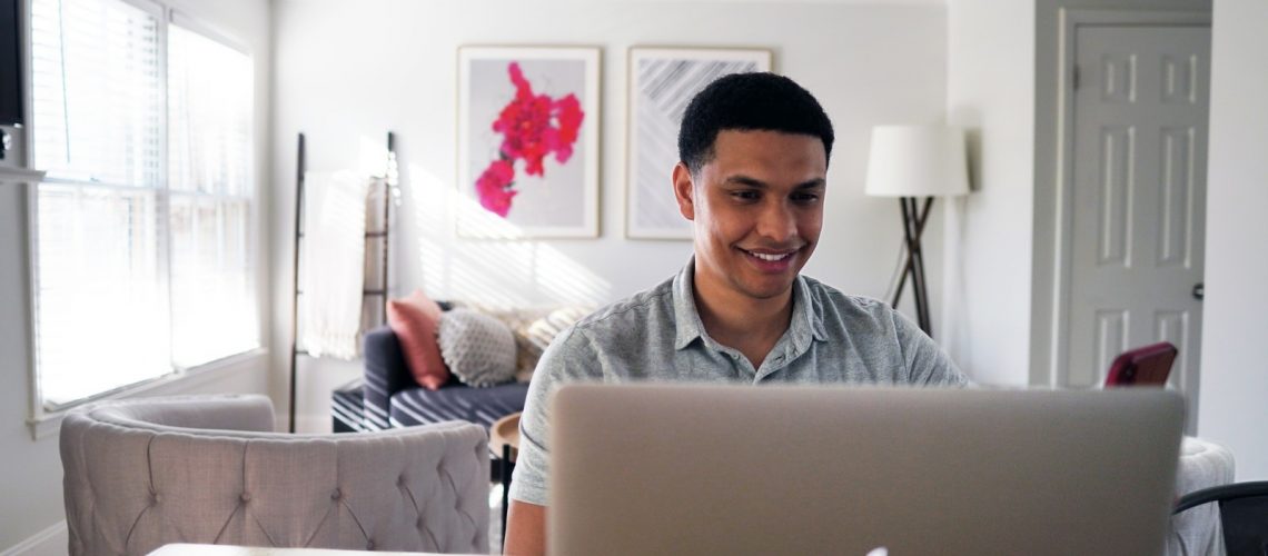 Advocate Finance Case Study- Financing a Unique Multi-Unit Block man on a macbook pro